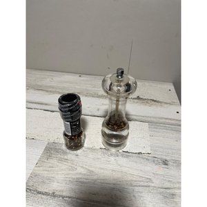 Pepper grinder with unopened jar of McCormick peppercorn medley